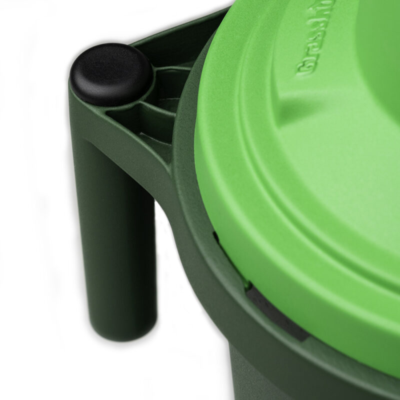 Close-up of carrying handle of Grasshopper harvesting and packing tool.