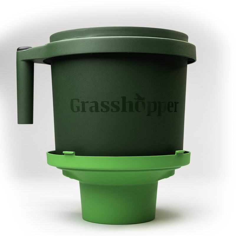 Grasshopper handheld harvesting and packing tool on top of removable lid.