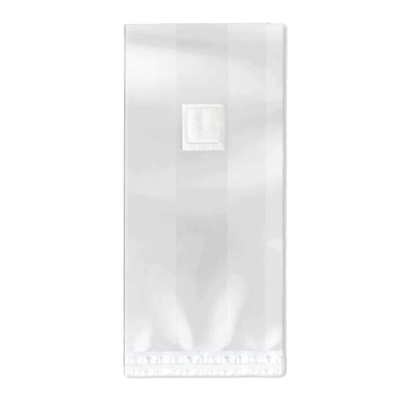 A clear, autoclavable plastic bag with a square white filter patch at the top designed for growing mushrooms.