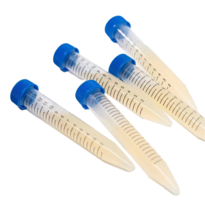 5 small test tubes with beige agar gel at a slight angle within scattered about.