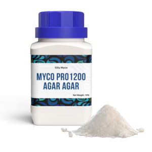 A white bottle of Silly Myco Agar Agar powder with a blue lid beside an off-white pile of the agar agar powder contained in the bottle.