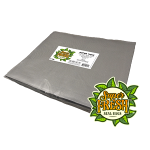 A stack of metallic SuperFresh Seal Bags, each measuring 15x18 inches, with a super thick design for vacuum sealing. The stack features a white label on top with the green and orange SuperFresh logo and product details, including a QR code, set against a dark background.